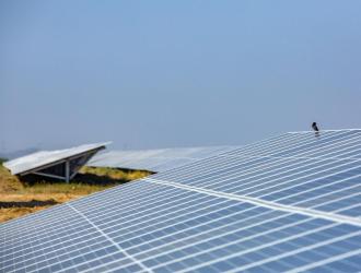 Overview of the solar power plant - Khirasara solar power plant, Gujarat, India (solar panels, photovoltaic panels, Adani Green Energy Limited, photovoltaic panel, solar farm, energy transition)